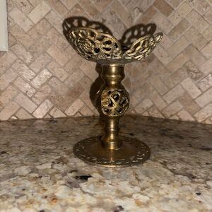 This is a vintage Andrea by Sadek ornate brass filigree candlestick